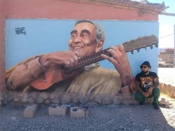 El muralista Cristián "Kave" Acosta viajó desde Moreno (Provincia de Buenos Aires) y pintó en la Casa del Tantanakuy al troesma Jaime.