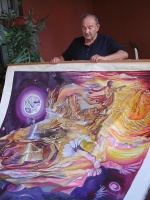 Cornide desplegando el mural ( 2 por 2 metros) "El nacimiento del charango"